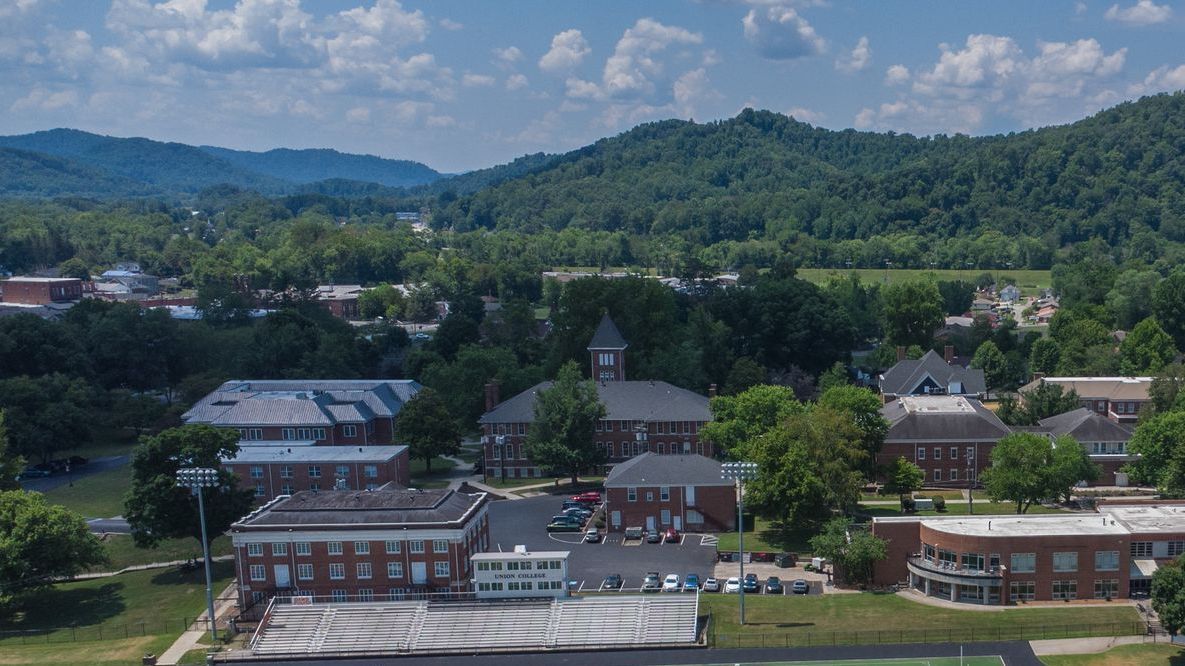 drone aerial shot of campus buildings