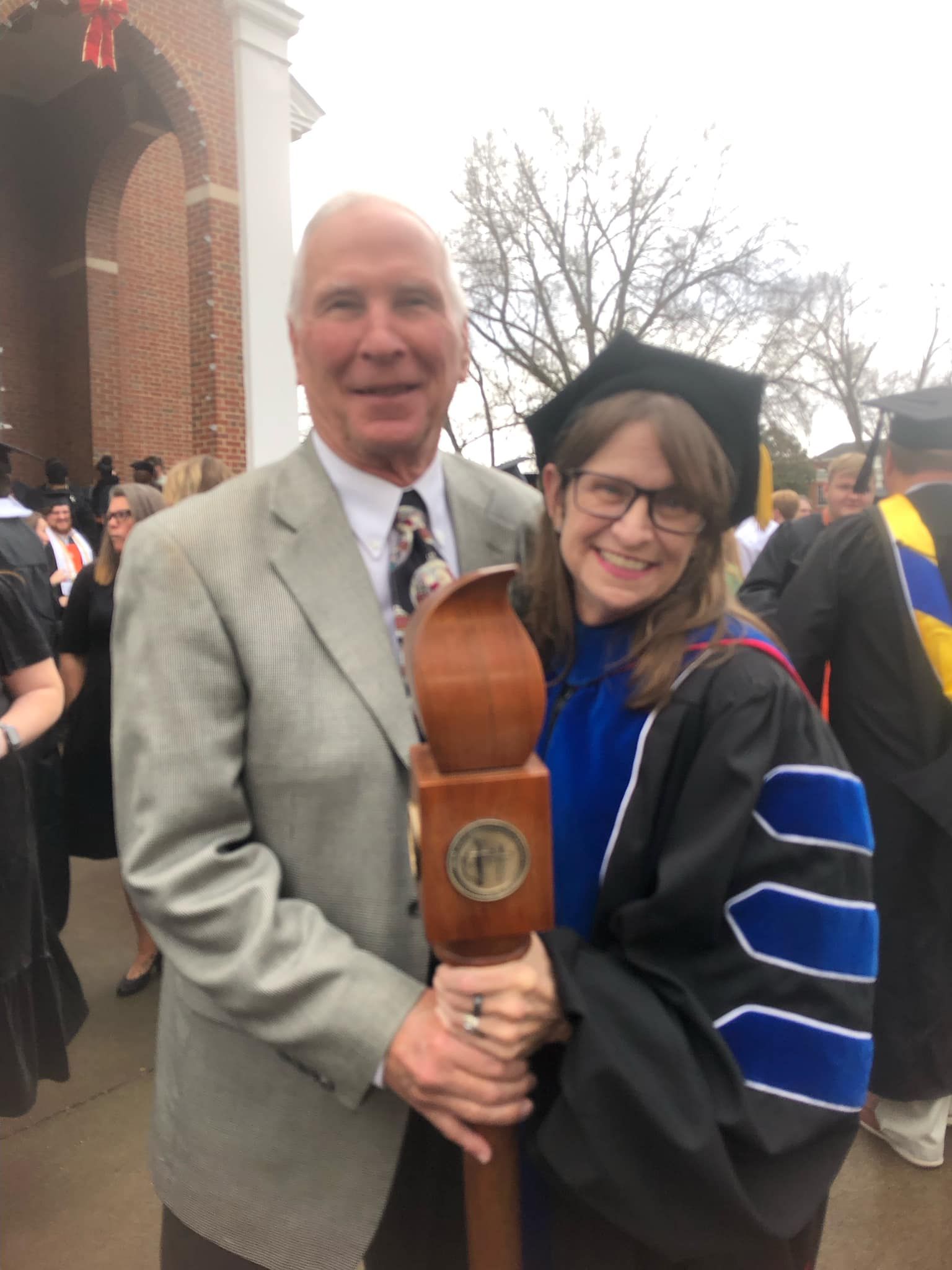 Dr. Larry Inkster and Dr. Christine Marley-Frederick holding Union's ceremonial mace.