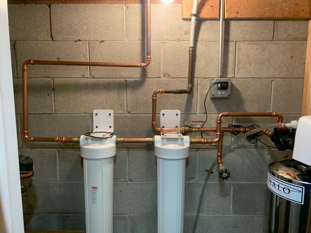 sump pump and piping in basement