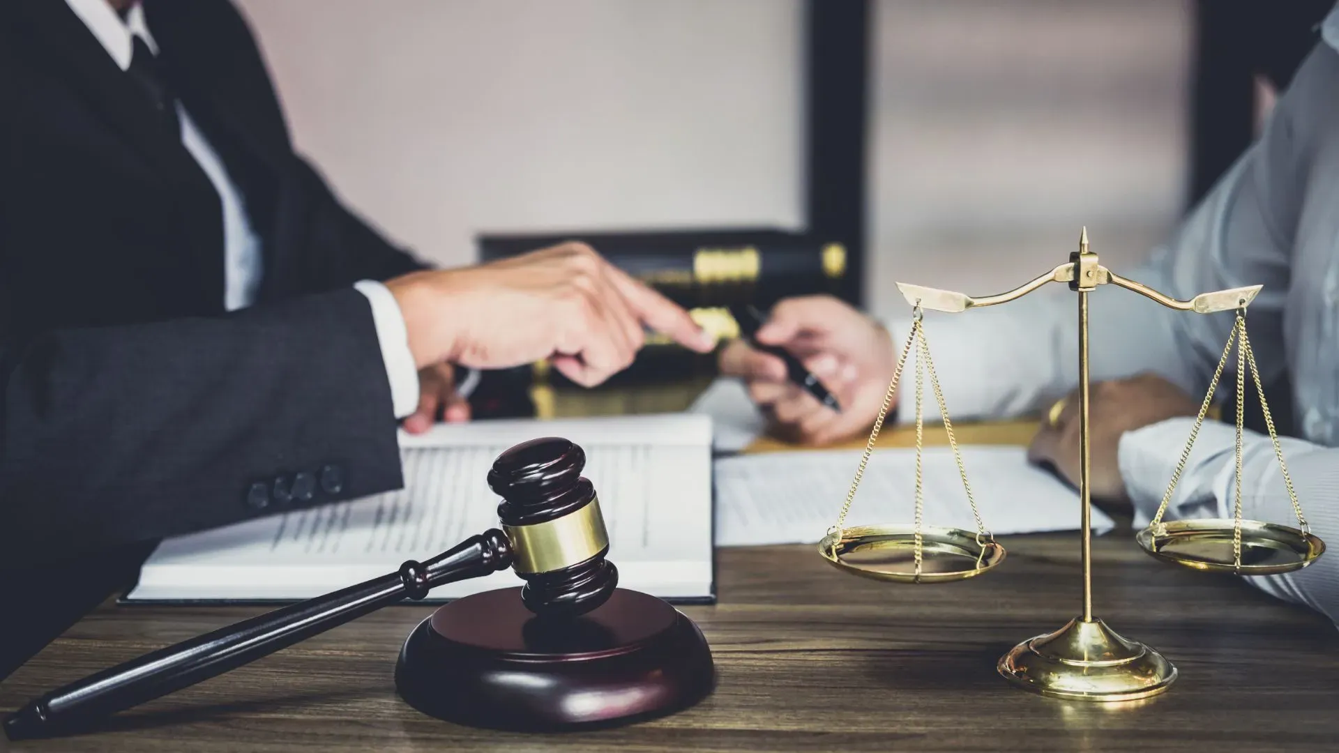 Attorney Pointing To A Man - West Des Moines, IA - Hopkins Law Office Attorney Pointing To A Man - West Des Moines, IA - Hopkins Law Office