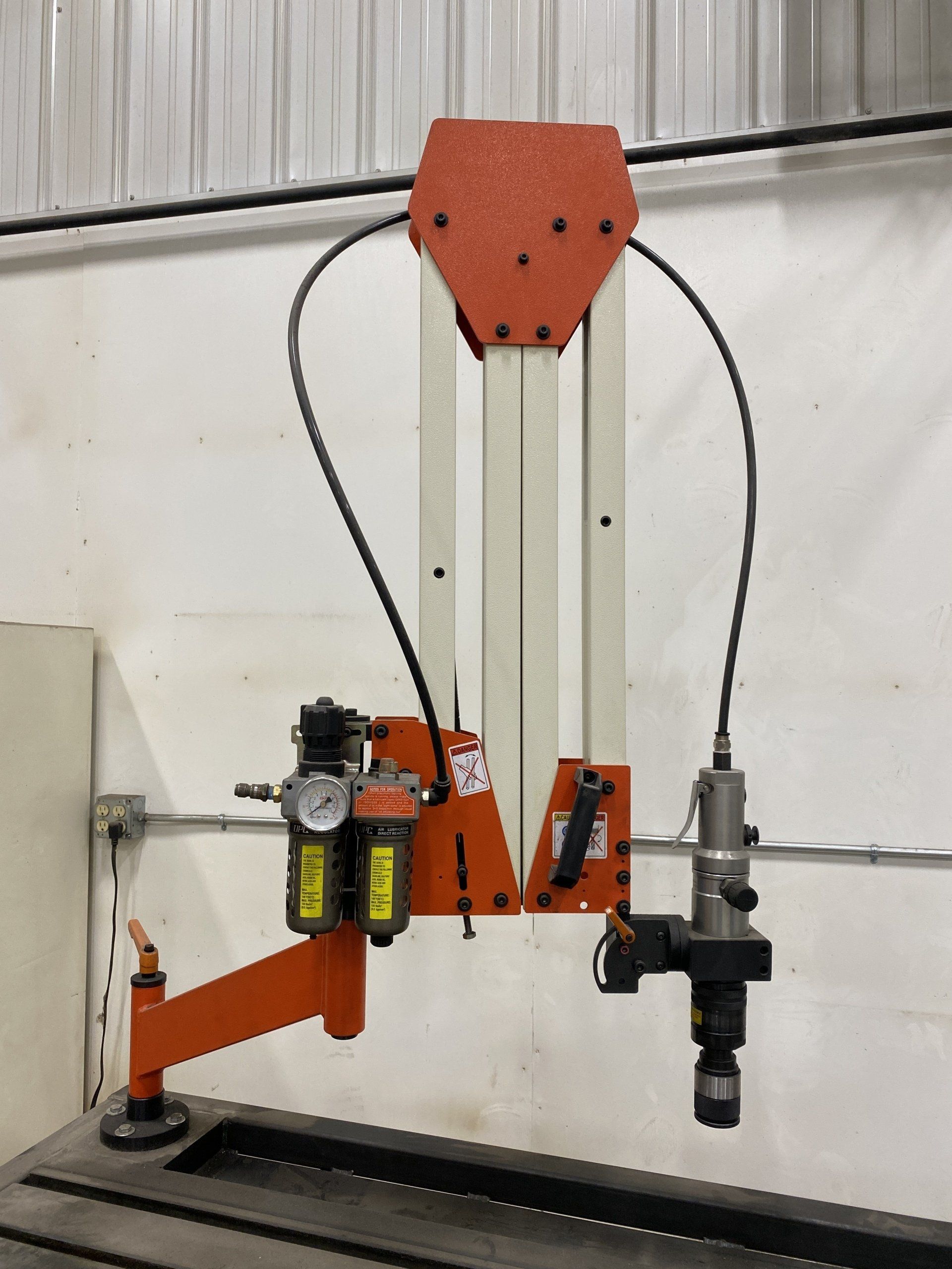 Tapping Arm