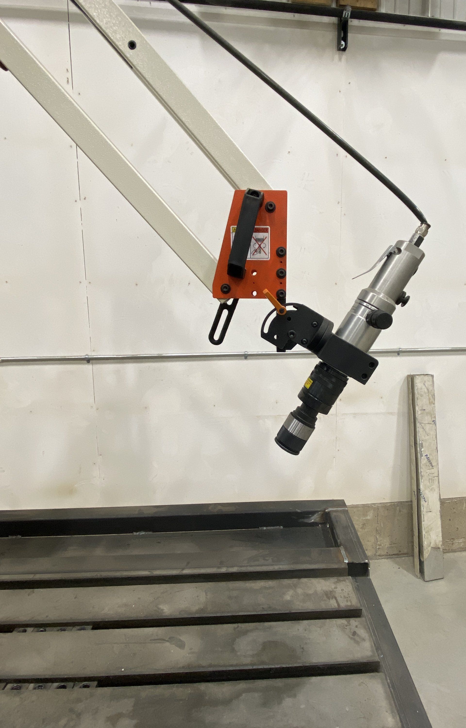 Tapping Arm