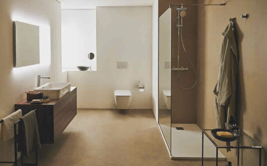 Modern bathroom with a walk-in shower, floating toilet, wood vanity, and beige and white tones.