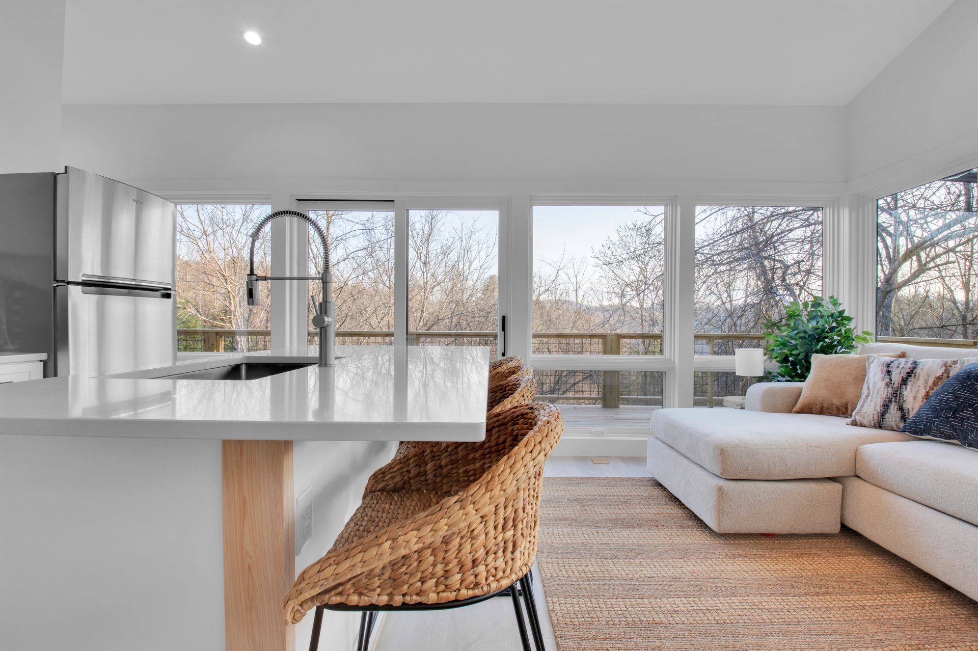 inside a tiny home kitchen and living room built by Nanostead
