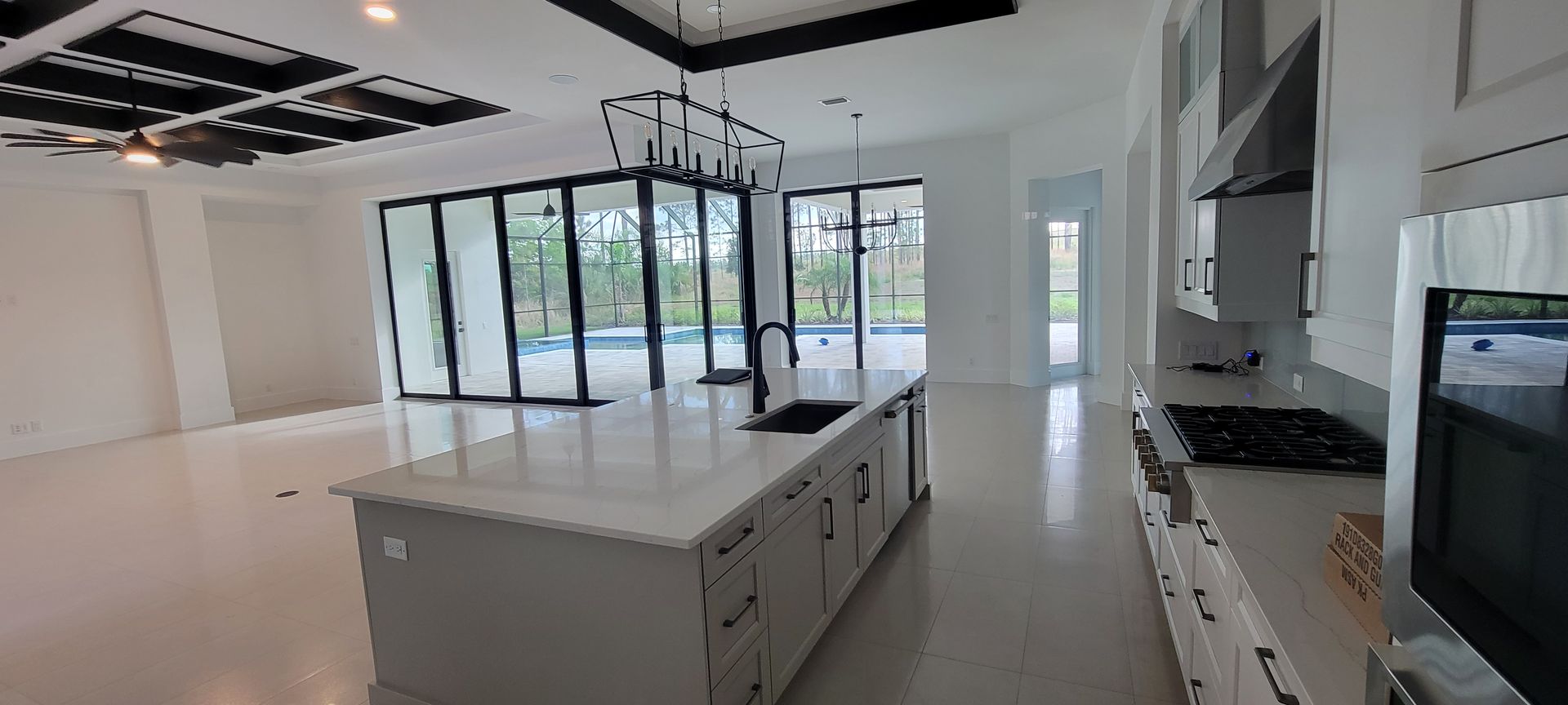There is a large island in the middle of the kitchen.