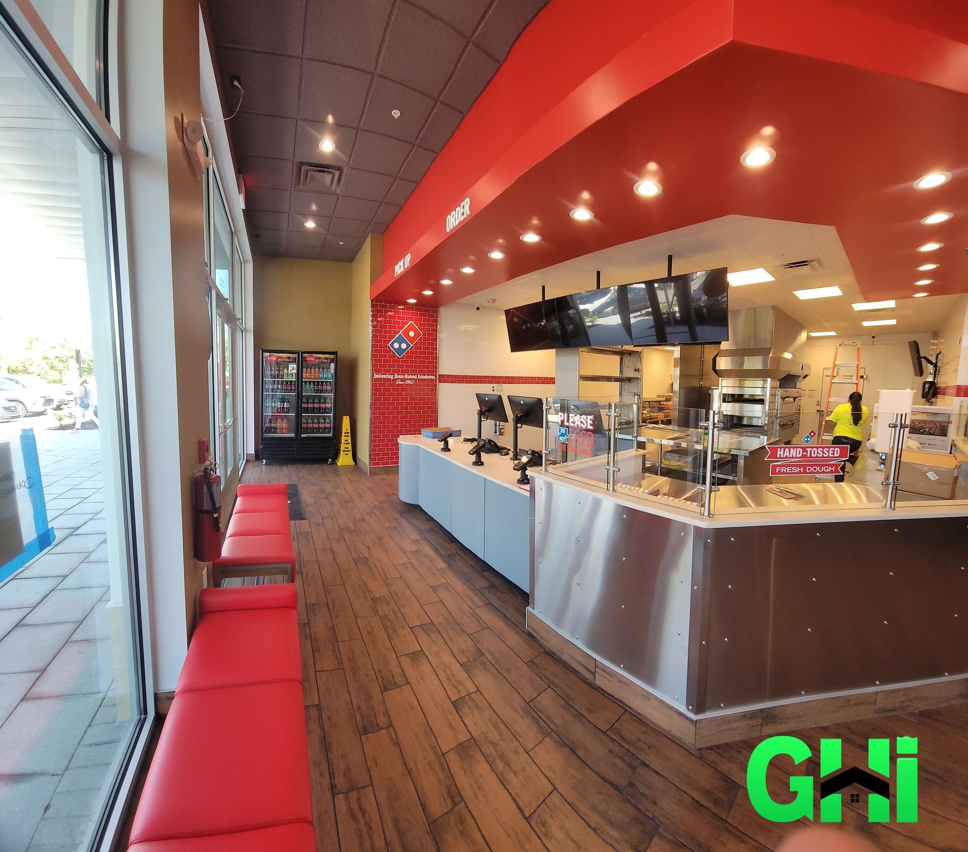 A picture of a restaurant with the word ghi on it