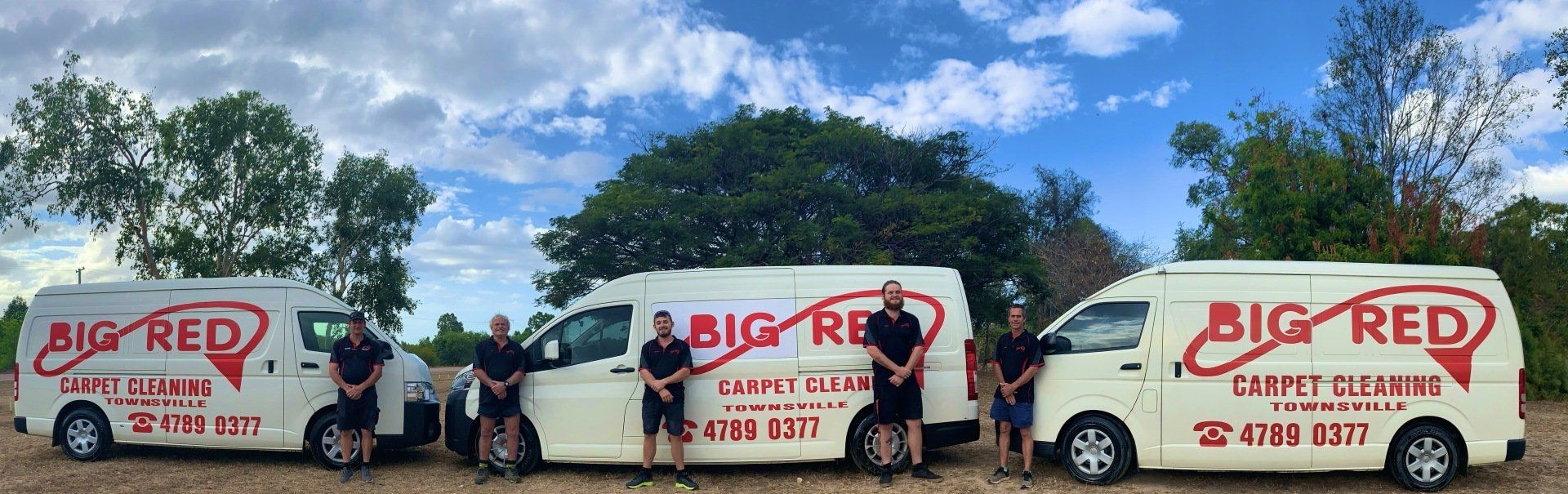 Staffs In Big Red Carpet Cleaning — Carpet Cleaning In Townsville QLD