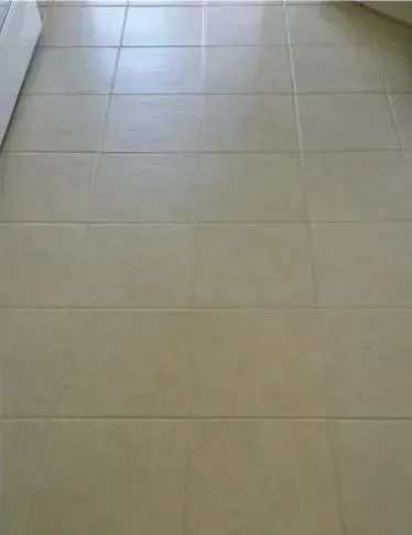 A close up of a tiled floor in a room.