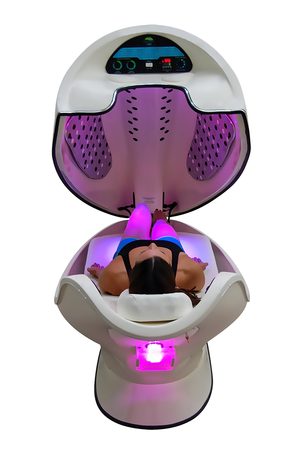 Person lying in a white and pink spa pod, lit with pink lights. The pod is open.
