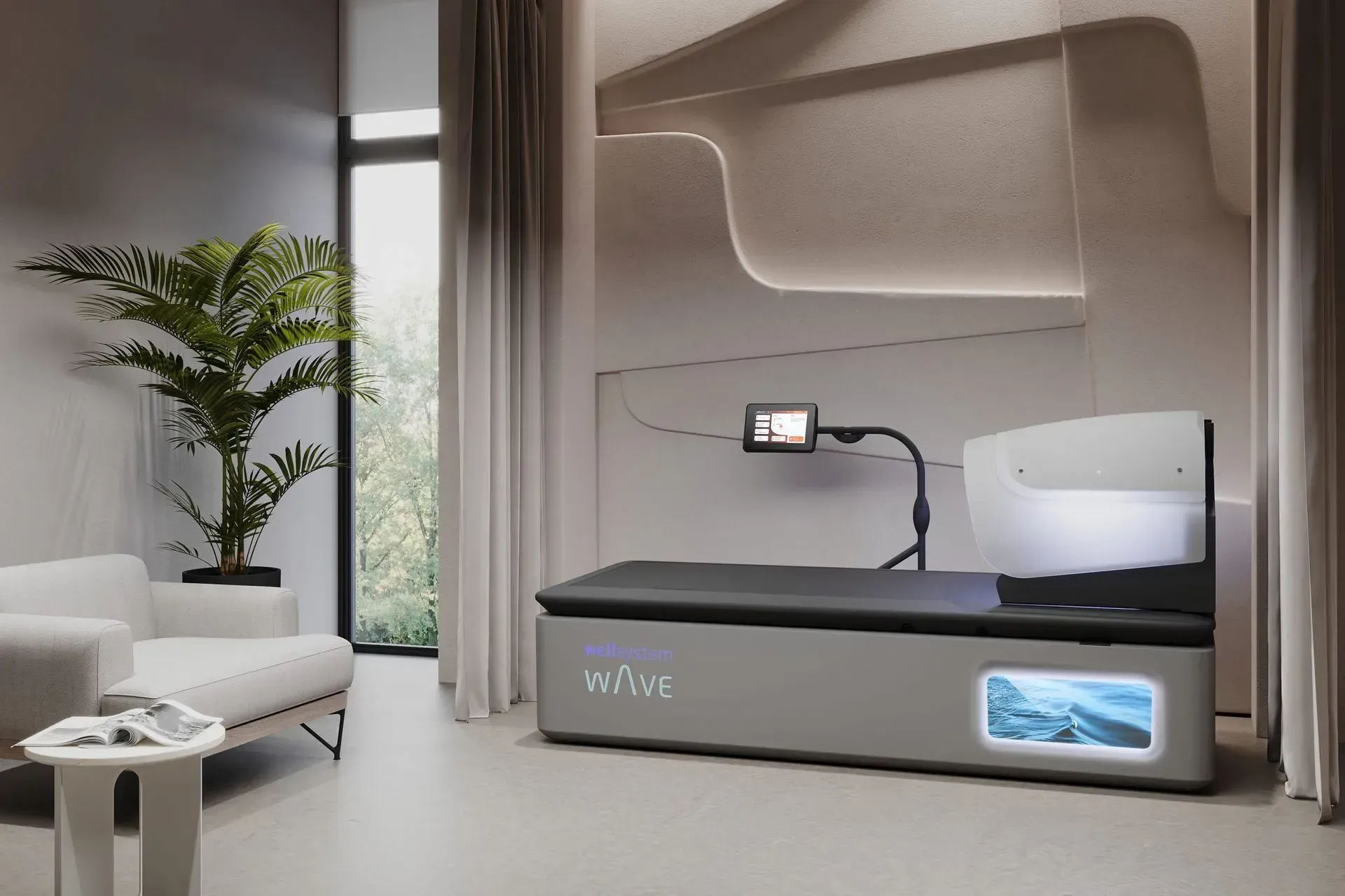 Modern wellness bed in a minimalist room with a screen and a potted plant.