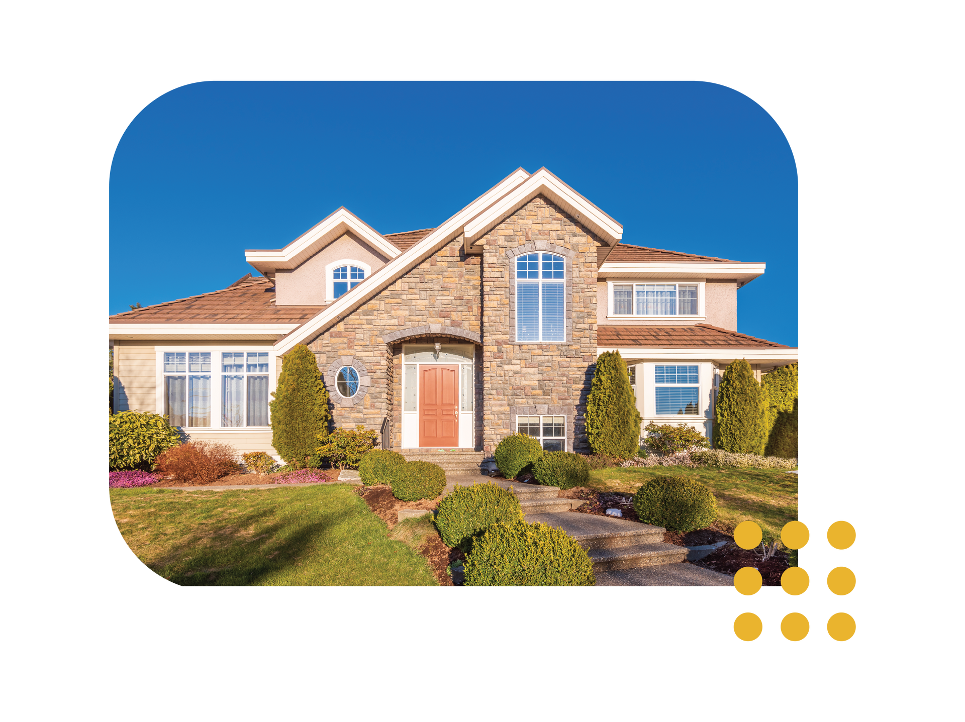 Large brick suburban house with a manicured front lawn and blue sky background