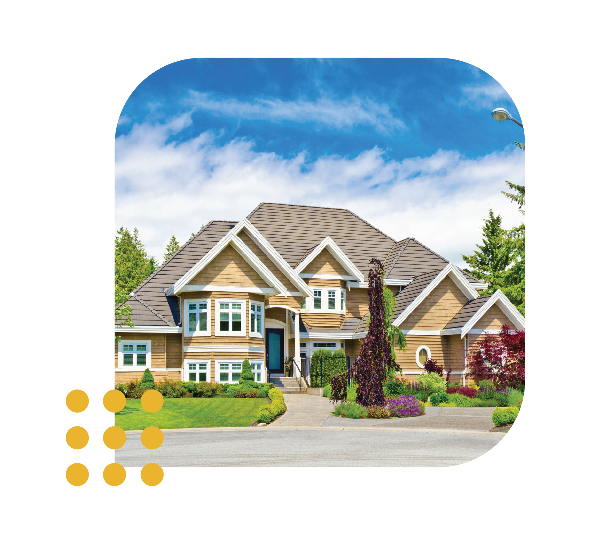 Large suburban house with stone and wood exterior, manicured lawn, and blue sky with clouds