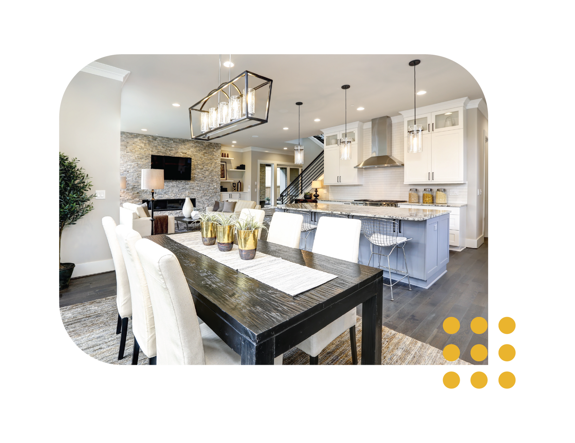 Bright modern kitchen and dining area with white cabinets, gray island, and black chandelier
