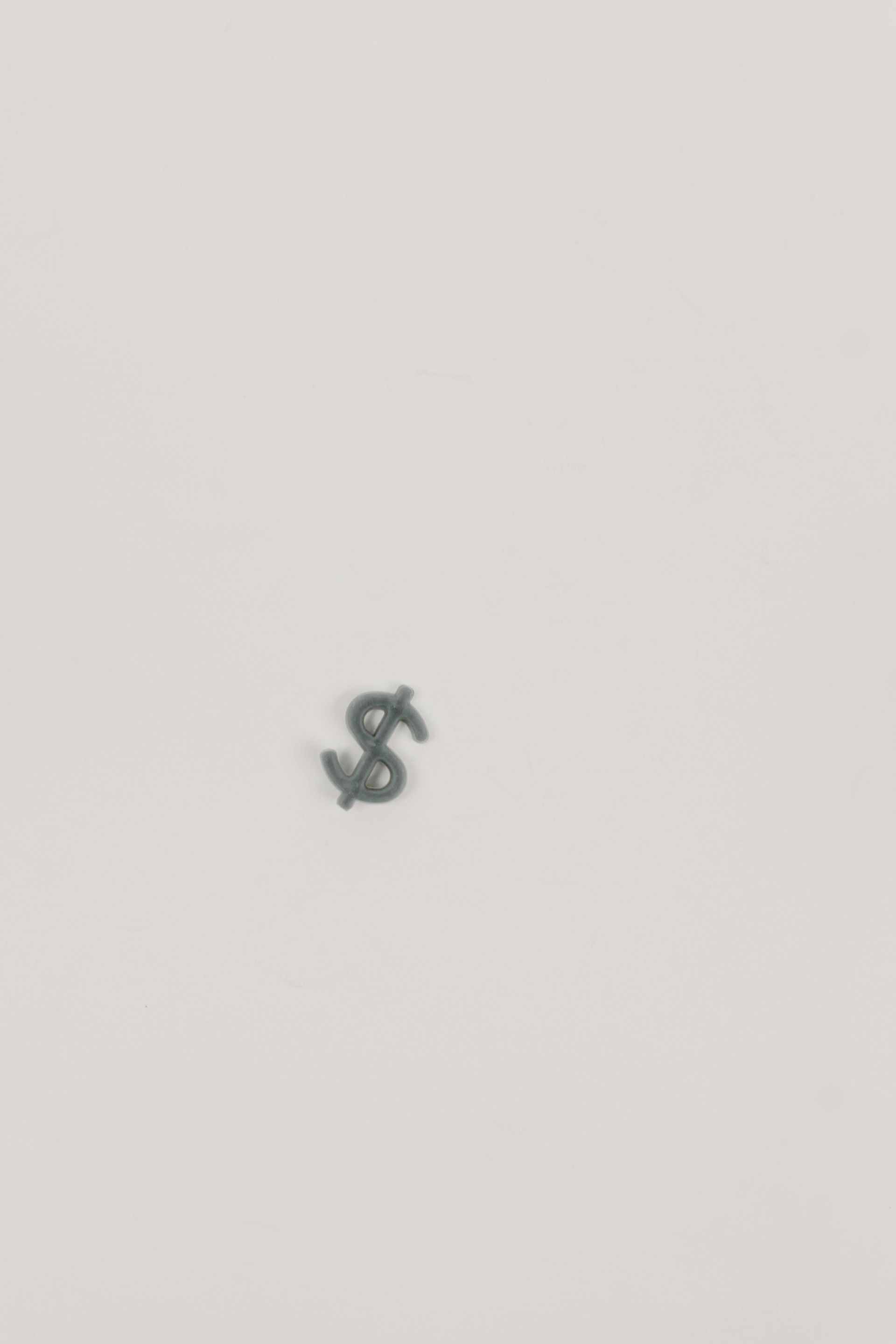 Dollar sign on a white background.