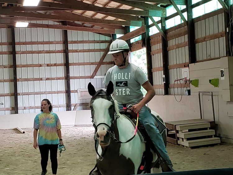 man riding a horse