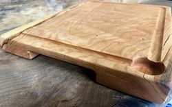 Wooden cutting board.