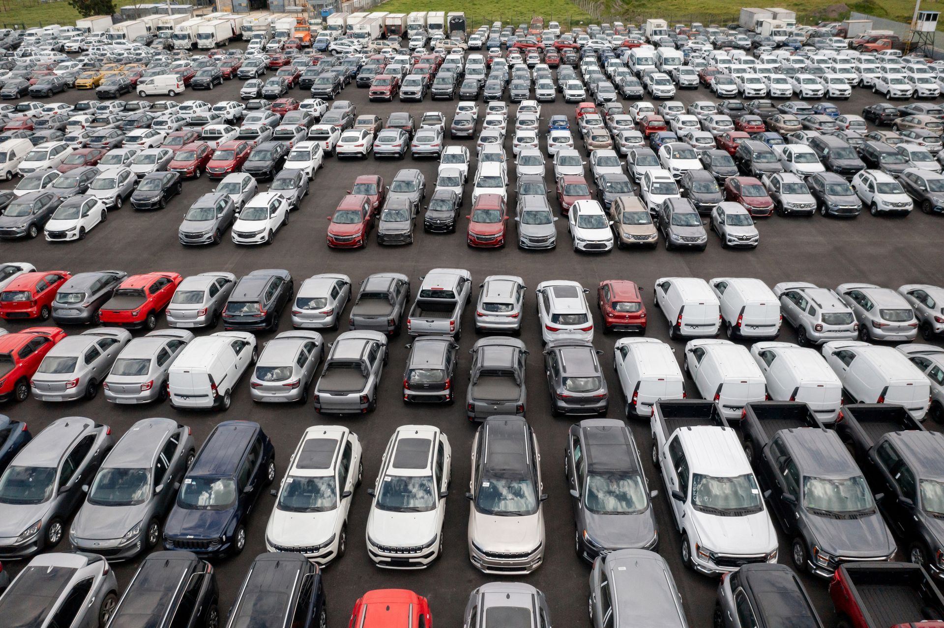 Fleet of parked vehicles highlighting commercial auto insurance. Commercial Auto Insurance