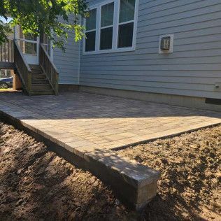 A paver stone patio in Rock Hill, SC by Carolina Mega Concrete LLC