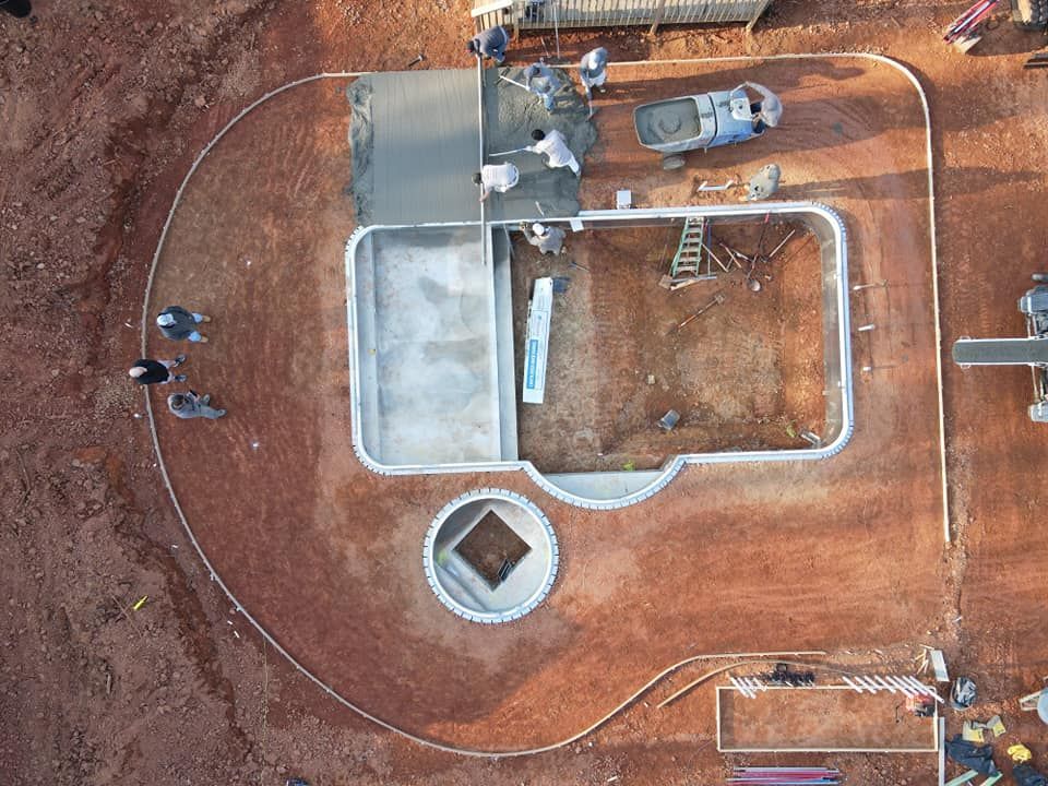 An aerial view of concrete pool deck being framed out in Rock Hill, SC - Carolina Mega Concrete LLC hard at work