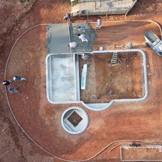 An aerial view of concrete pool deck being framed out in Rock Hill, SC - Carolina Mega Concrete LLC hard at work