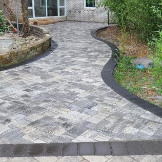 A paver stone patio in Rock Hill, SC by Carolina Mega Concrete LLC
