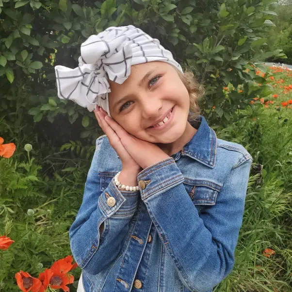 Beautiful girl smiling outside