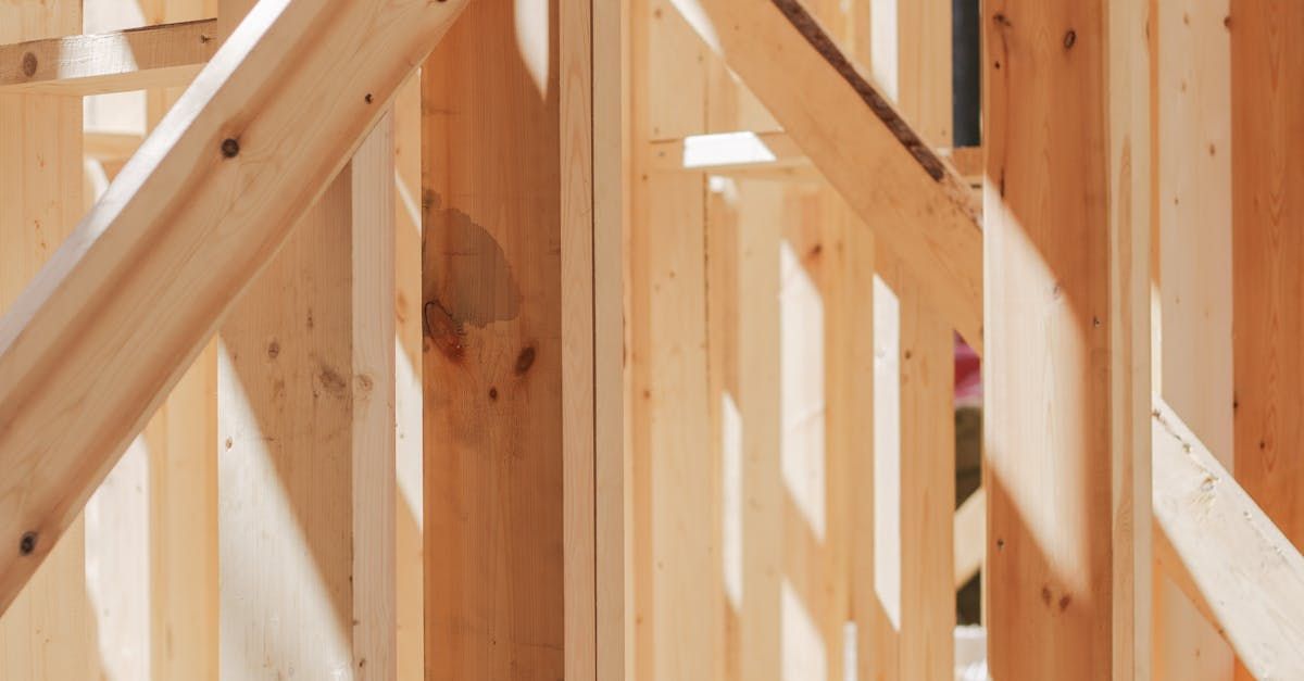 A close up of a wooden structure under construction.