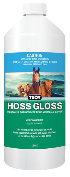 A Bottle of Hoss Gloss with A Picture of Horses and Dogs on The Label — Edmonds Landscaping Supplies in Bohle Plains, QLD