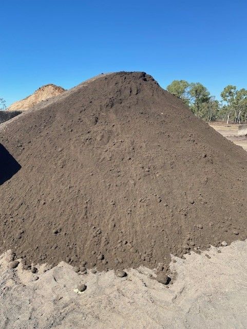 Pile of Gravel is Being Poured Into a Pile of Gravel — Edmonds Landscaping Supplies in Bohle Plains, QLD