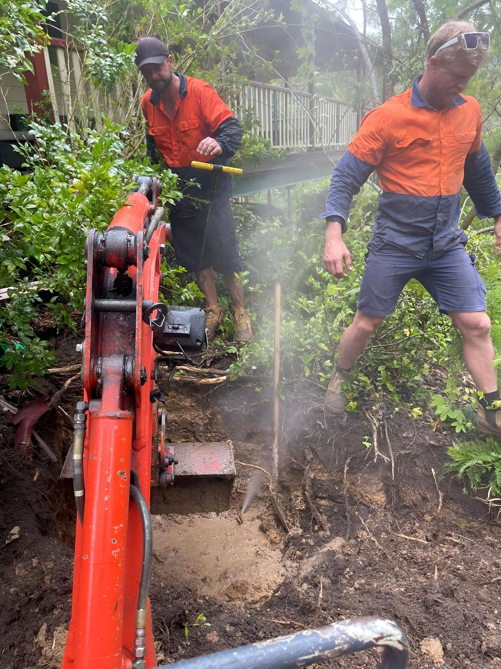 A Blue Pipe With Two Valves Attached to It — Gold Coast Leak Detection in Tallai, QLD