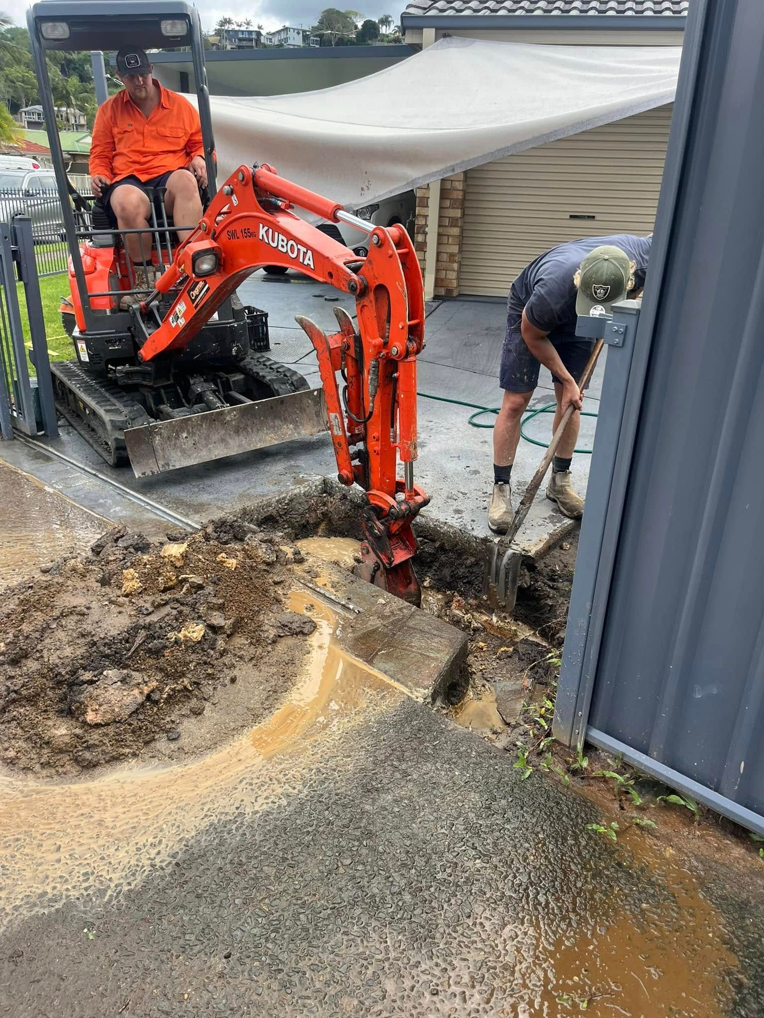 Workers Using a Mini-excavator and Shovel — Gold Coast Leak Detection in Tamborine Mountain, QLD