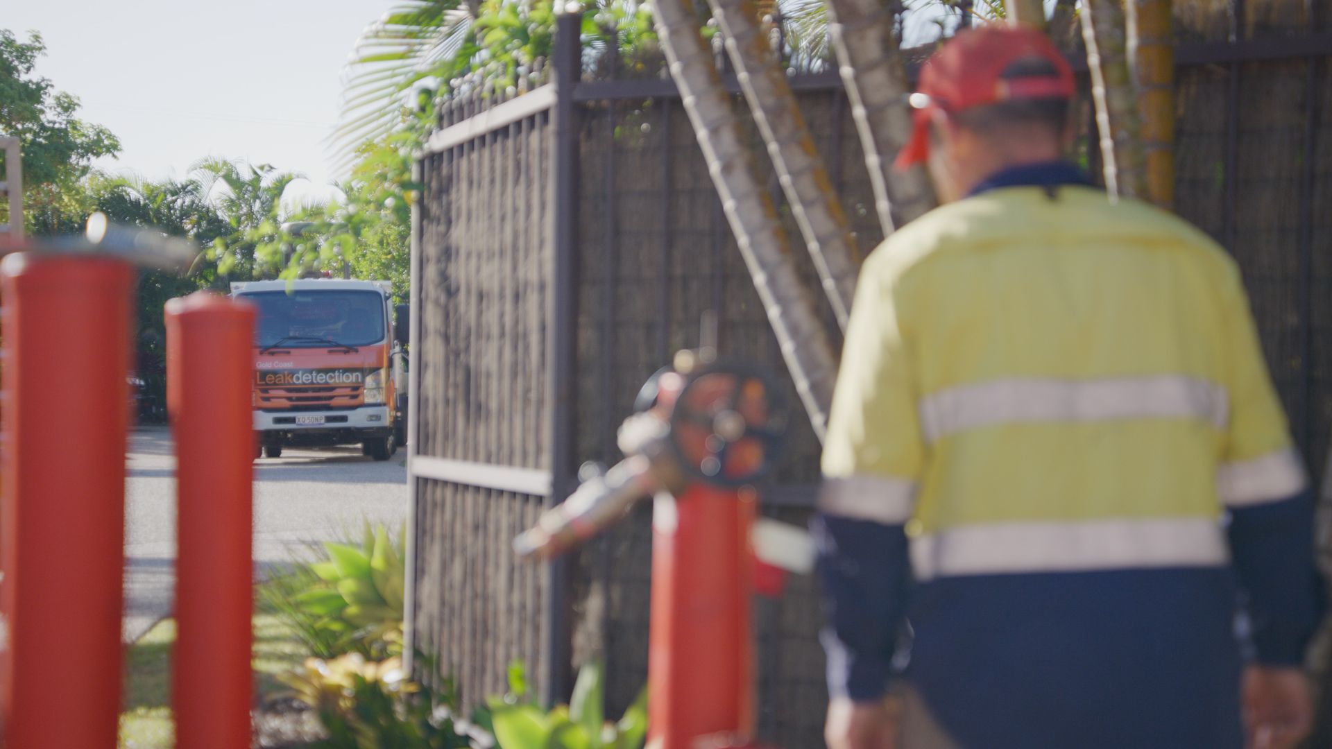 A Man is Working on a Blue Pipe in the Dirt — Gold Coast Leak Detection in Currumbin, QLD