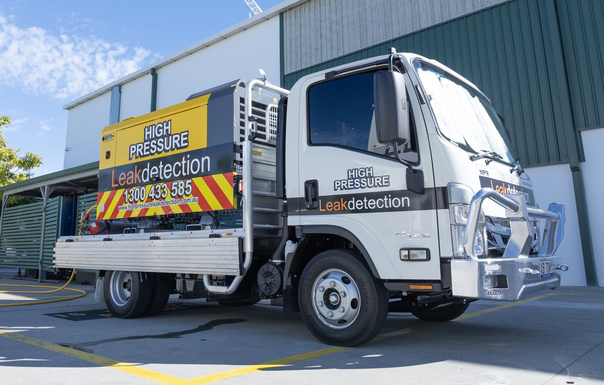 White Truck With Yellow Equipment For Leak Detection Parked Outside A Building — Gold Coast Leak Detection in Mudgeeraba, QLD 