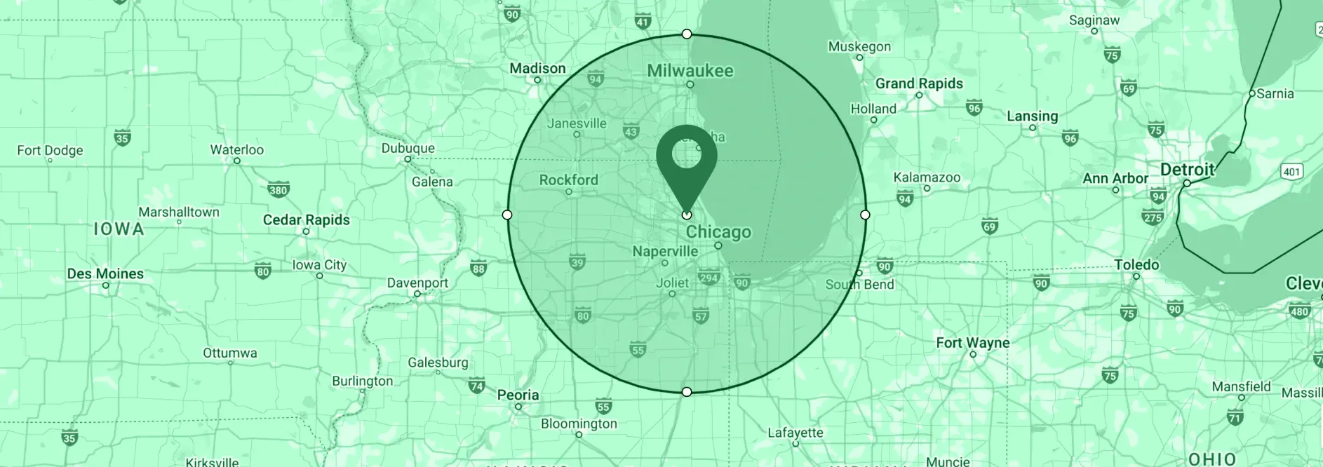 A green map with a pin in the middle of it.