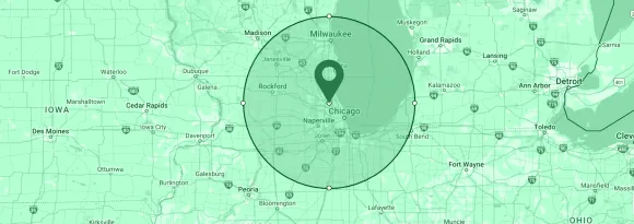 A green map with a pin in the middle of it.
