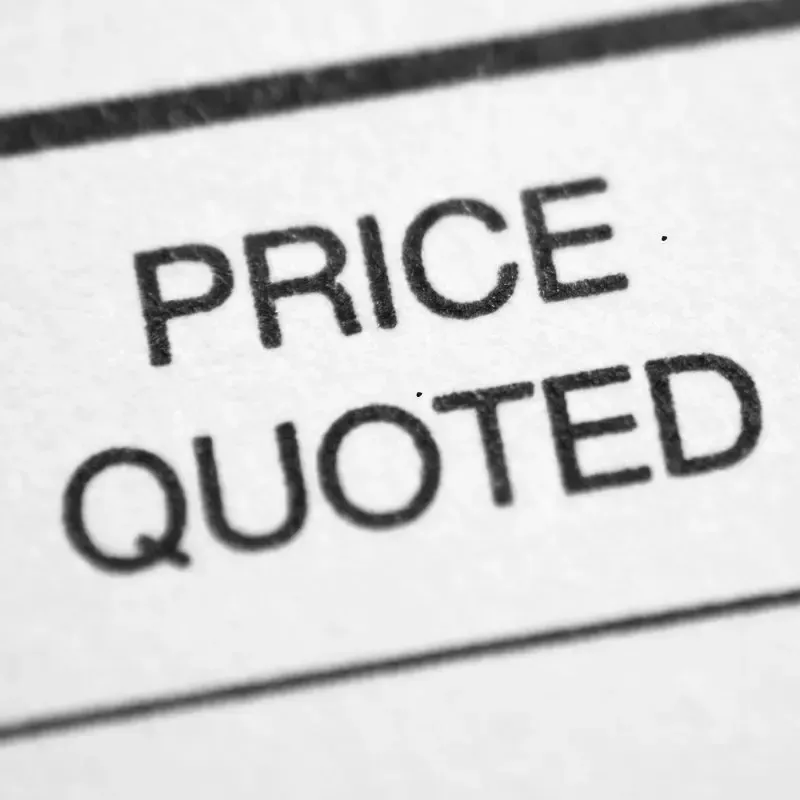 A paper with a price quote written in black ink.