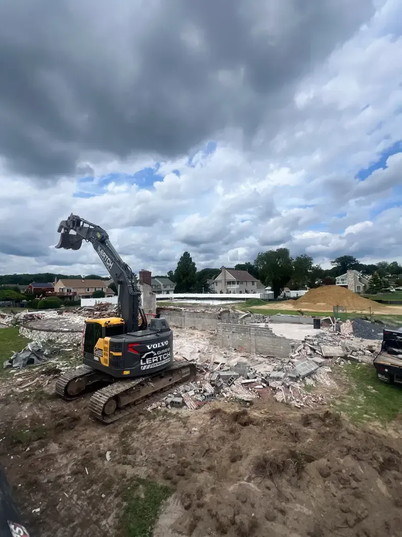 A large excavator is working on a construction site.