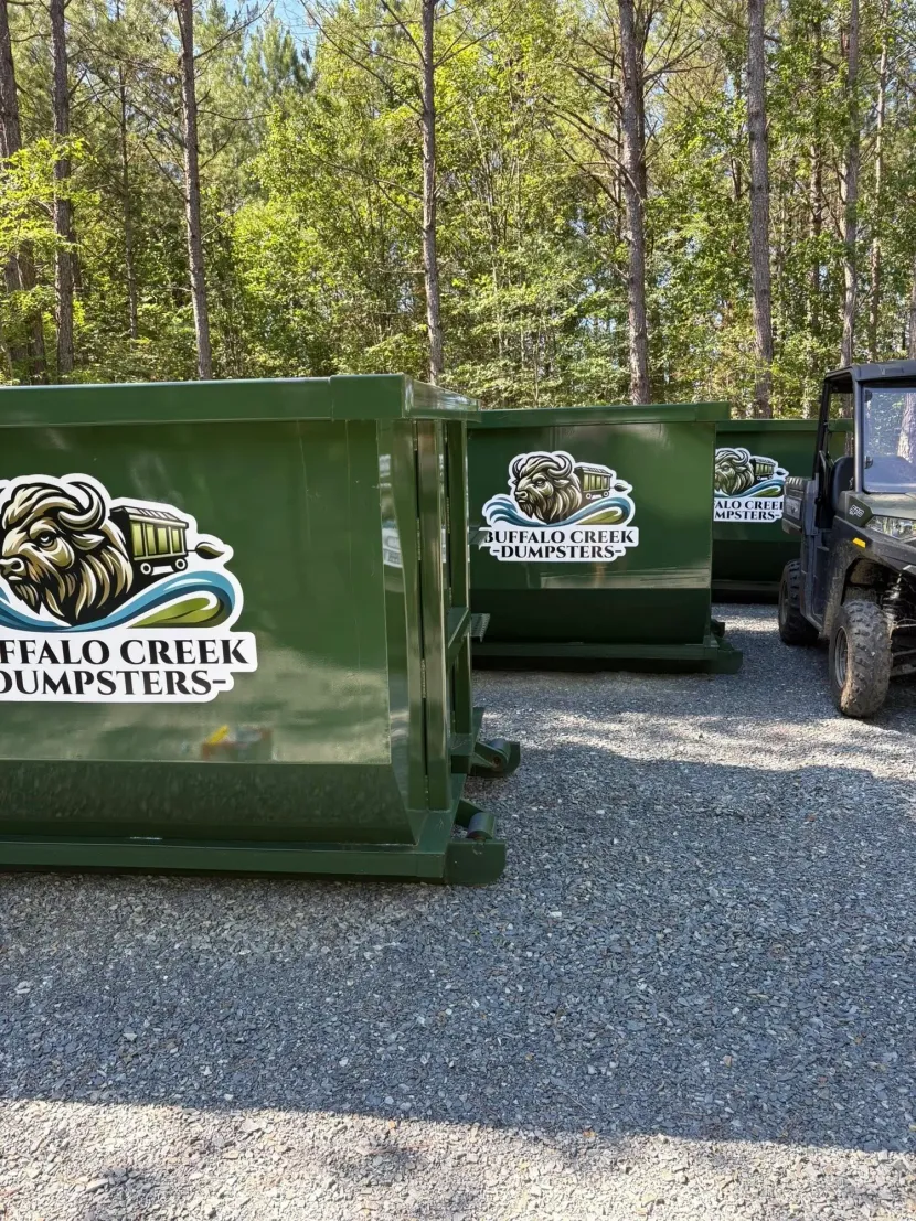Buffalo Creek Dumpsters in the yard. 