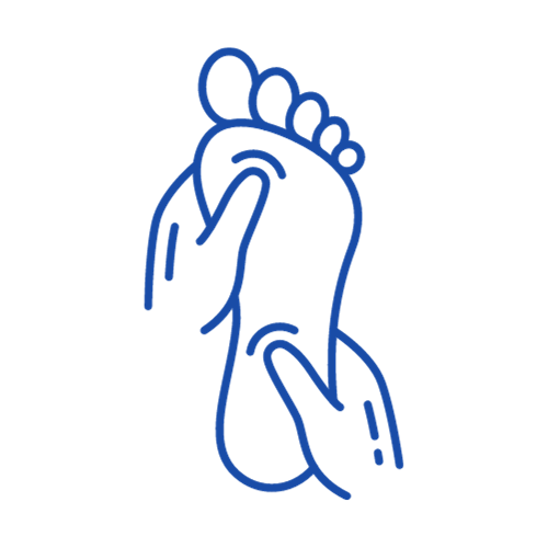 A foot in a reflexology session.