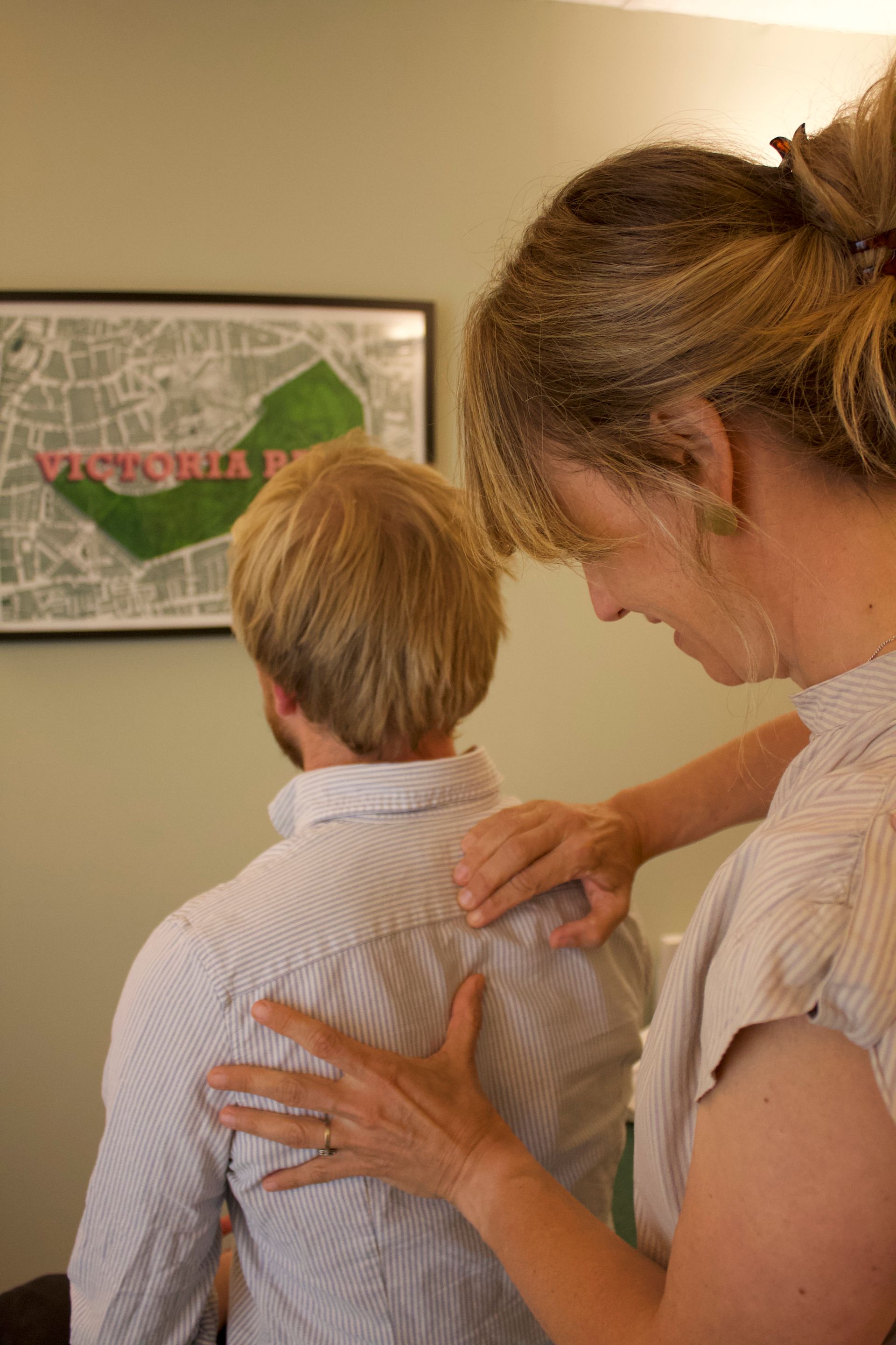 Osteopath treating a patient.