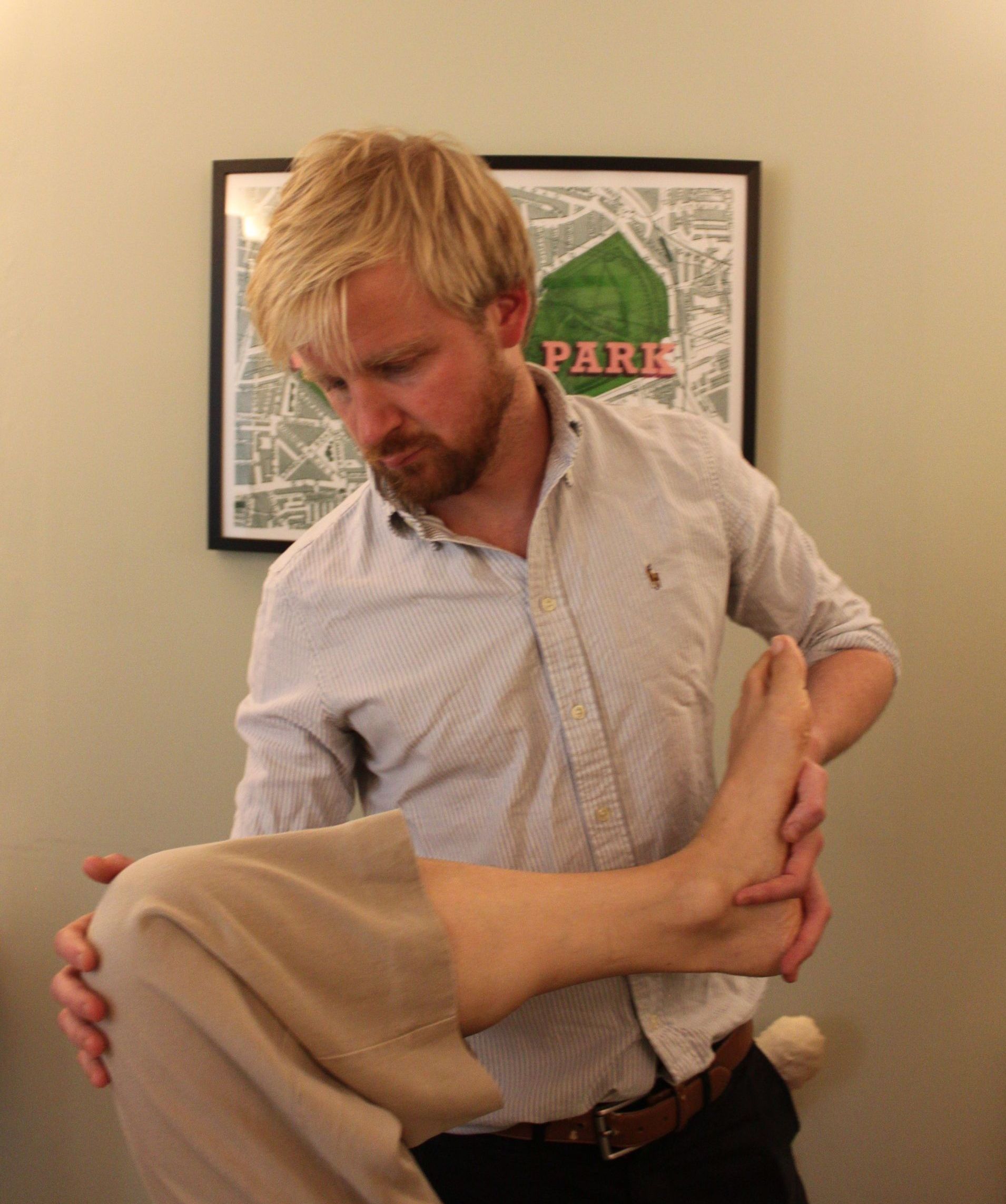 Osteopath treating patient