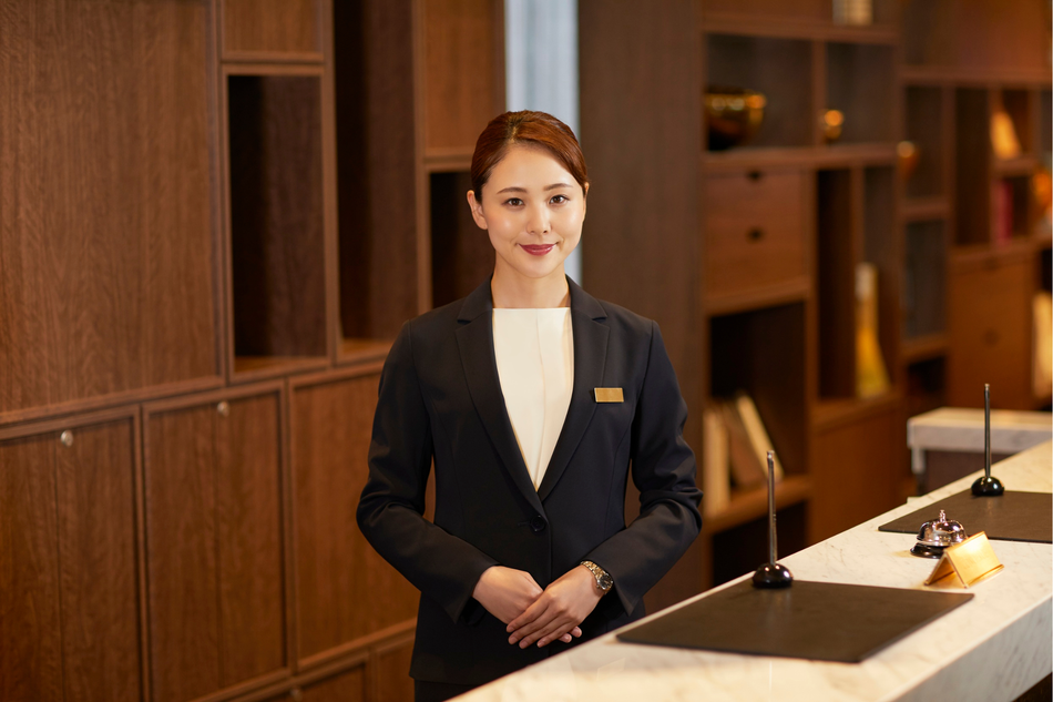 Hotel staff member at front desk