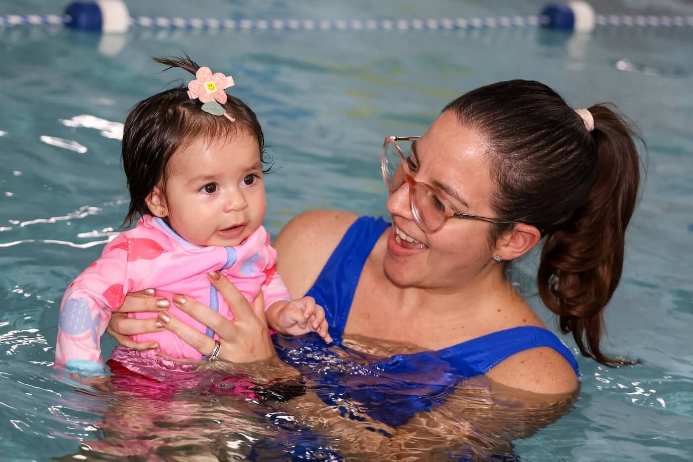 Swimming Lesson Baby and trainer swiming class