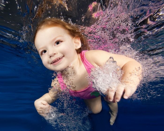 Enroll in Competitive Swimming Classes Photo of girls in pool