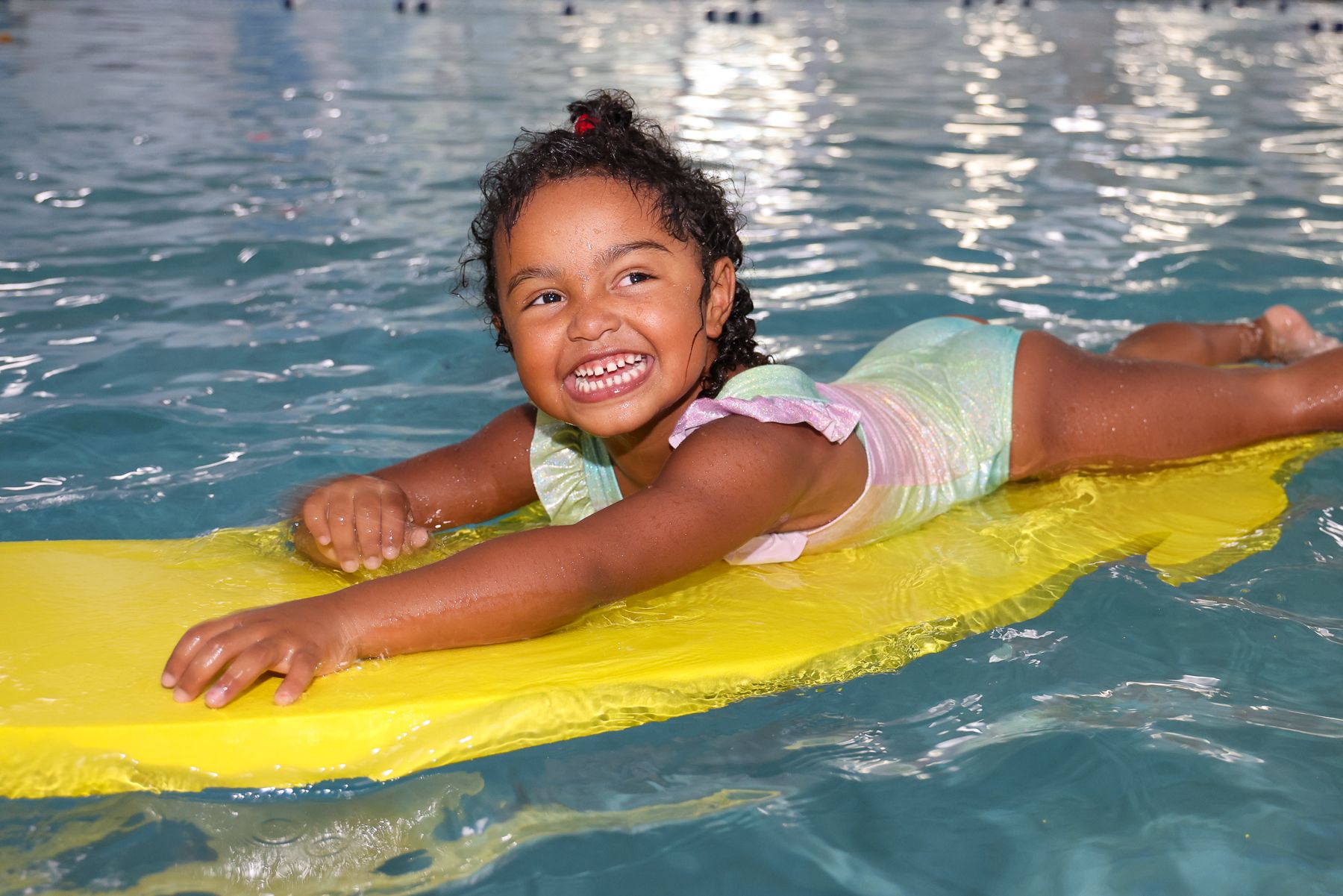 Little Girl Swimming Photo of a Little Girl in the Pool