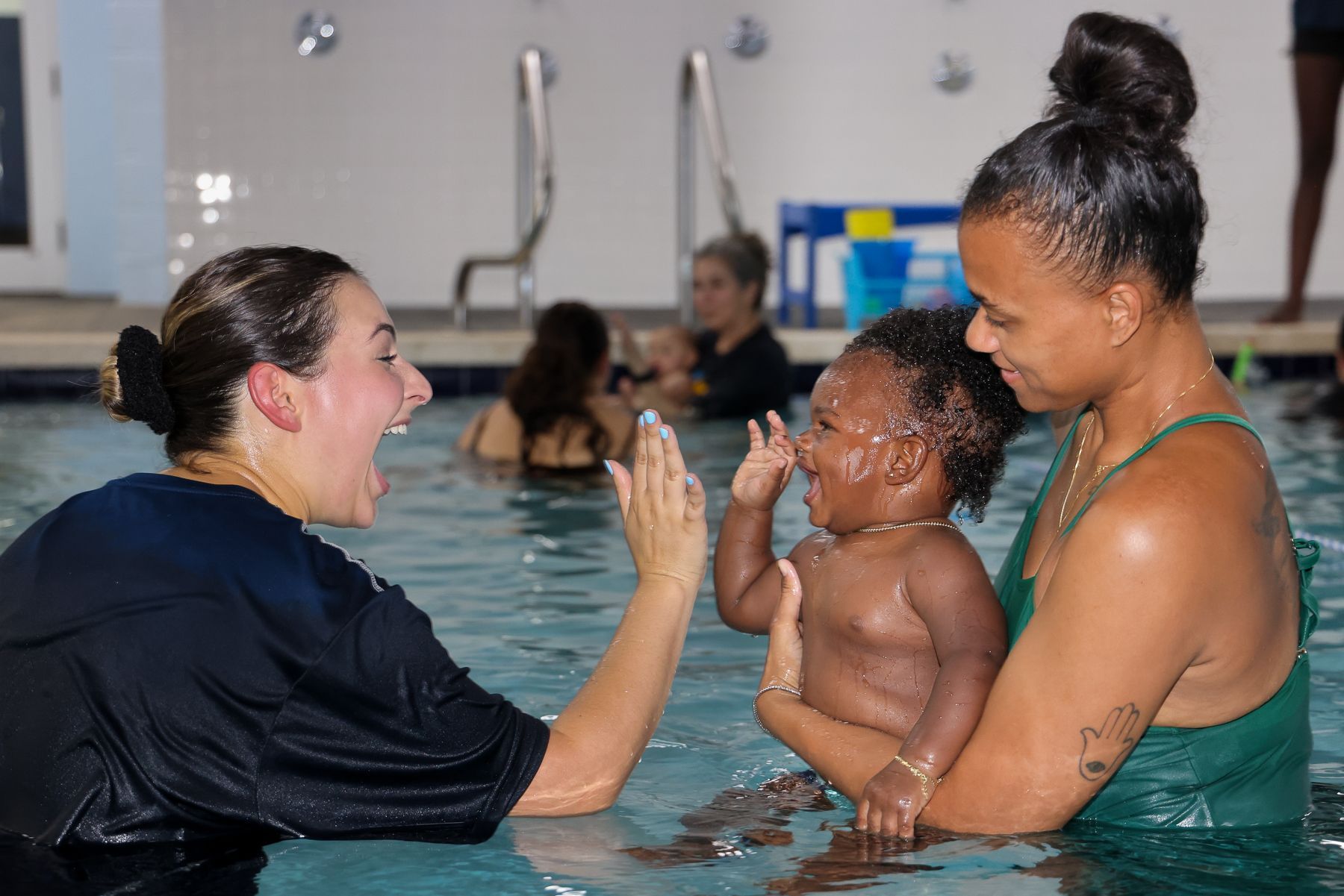 The Benefits of Professional Swimming Instruction for Children Photo of a swimming instructor