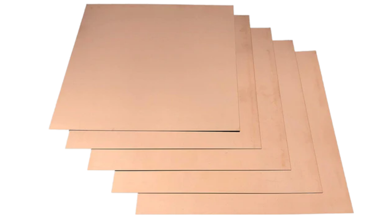 A stack of aluminum sheets on a white background.
