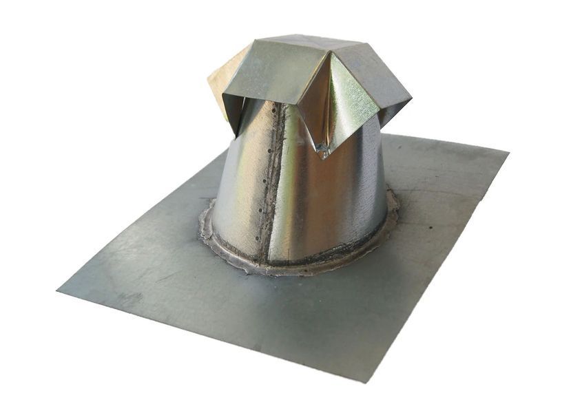A metal object with a diamond shaped top is on a white surface