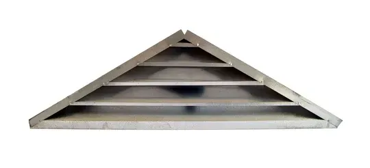A black and white photo of the roof of a building.