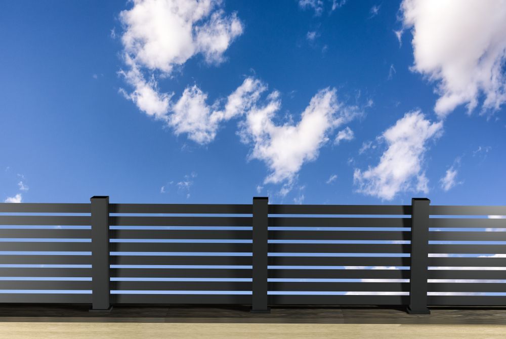 A Dark Grey Horizontal Slatted Privacy Fence — Frontline Fences in Tweed Heads South, NSW